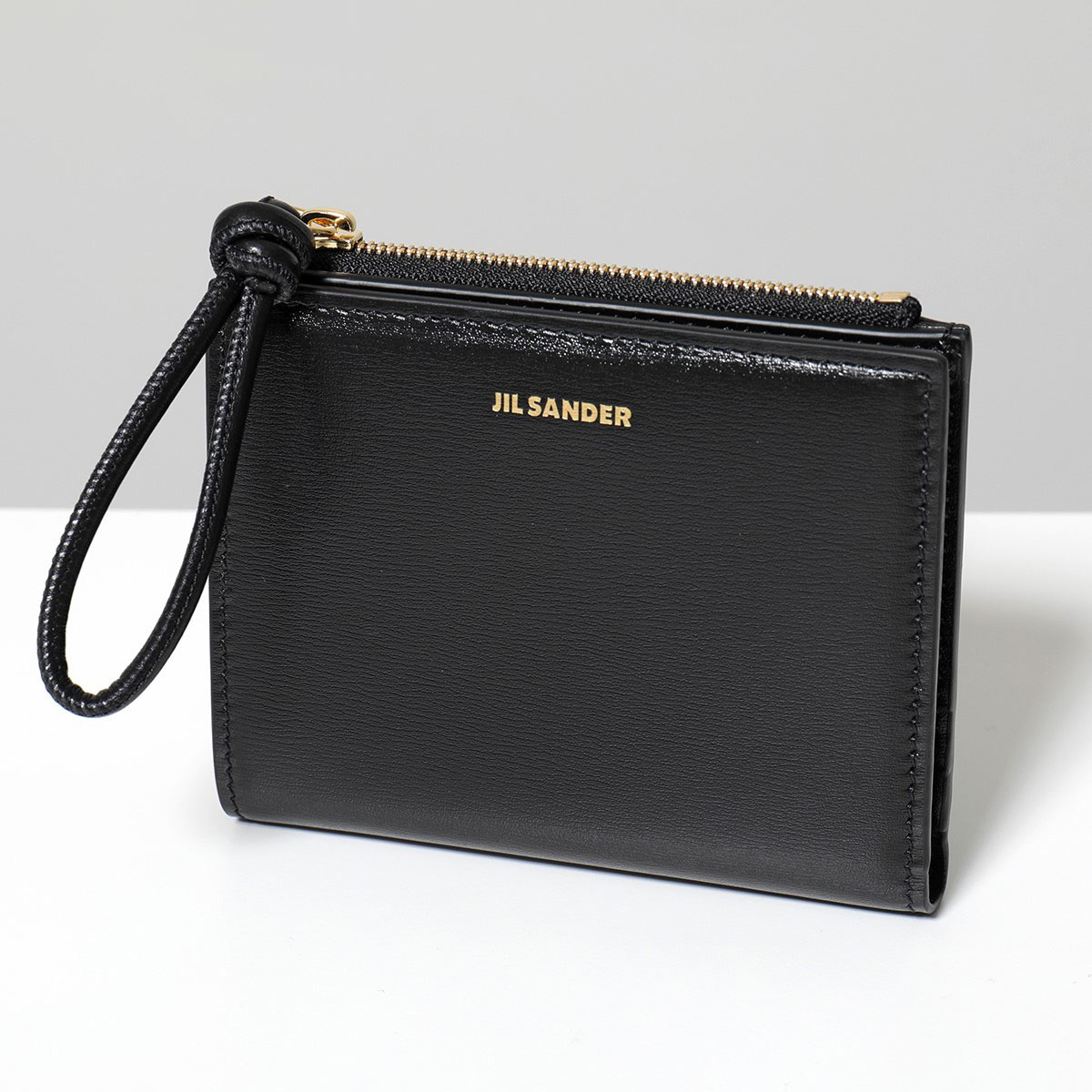 JIL SANDER ジルサンダー 二つ折り財布 J07UI0016 P4841 メンズ レザー ミニ財布 豆財布 ミニウォレット 小銭入れ付き ロゴ 001/BLACKの画像