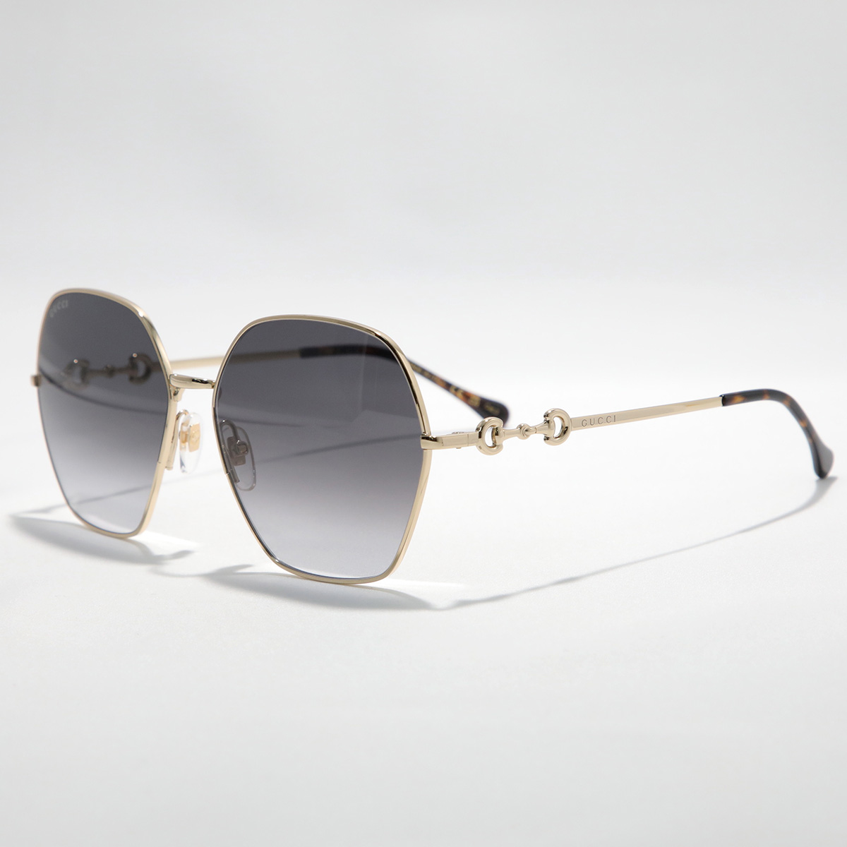 GUCCI（グッチ） サングラス GG1335S レディース ポリゴン型 メタル