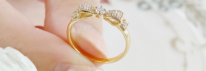 ete 18金リボン形ダイヤモンドリング 新品未使用品 ダイヤモンド リボン リング 指輪 ダイヤ フェミニン 0.2ct 18k YG 18