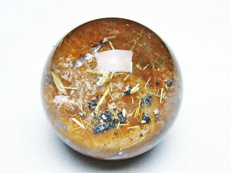 ゴールドタイチンルチル入り 水晶 丸玉 51mm [t637-4736] 1枚目