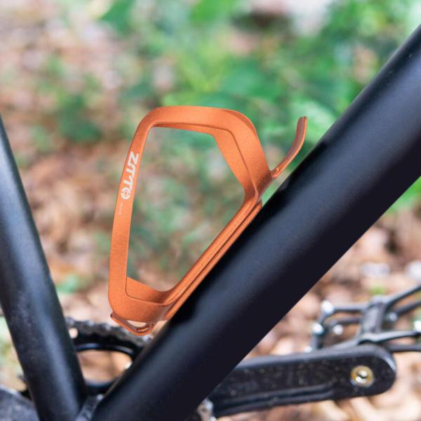 マウンテン バイクの乗馬の付属品のオレンジのための自転車の水差しのホールダーのアルミ合金