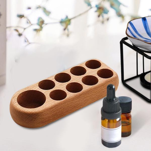 精油の陳列だな5ml 10mlの瓶の堅い木製の容器