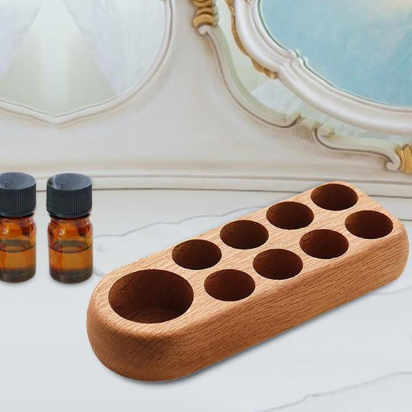 精油の陳列だな5ml 10mlの瓶の堅い木製の容器