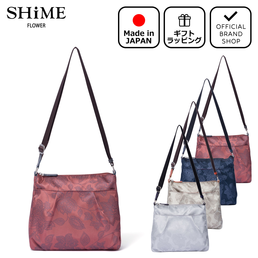 新品】TUMI レディースバッグ 花柄 ネイビー ビジネスバッグ 新品