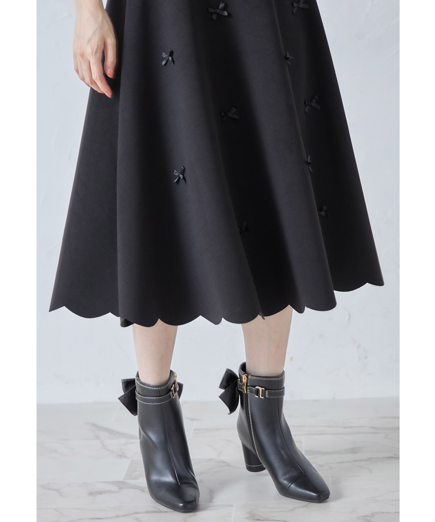 tocco closet リボン付き裾スカラップボンディングフレアスカート 