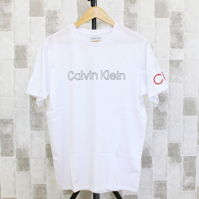 Calvin Klein CK トラベリングロゴ クルーネック 半袖Tシャツ ss travelin...
