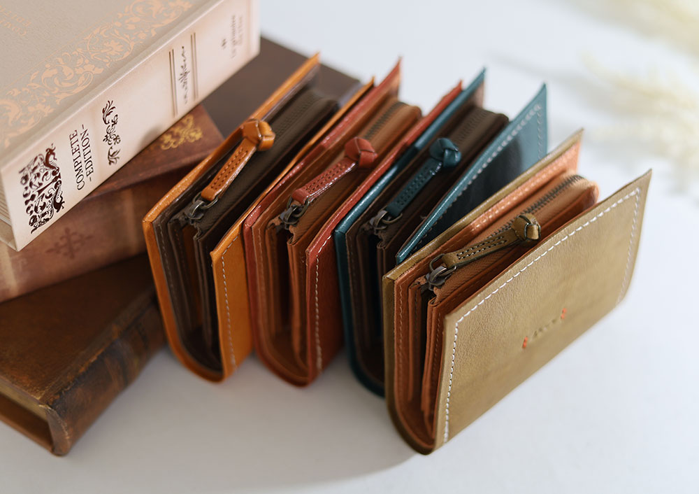 Dakota ピアッタ 二つ折り財布 0031531