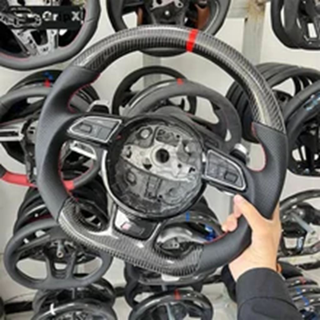 並行輸入品 アウディ A3 A4B8 A5 S3 S5 ファイバーフラットレザー セミパーフォレーテッドカーボン ボタンシフトパドル付きの画像